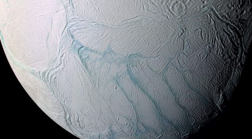 Cassini readings from Enceladus show a thin icy crust and surprising heat below